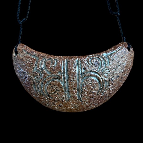 whaturei.png Moko Kauae - Clay Pendant